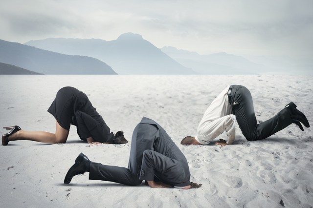 Concept of fear with businessman like an ostrich